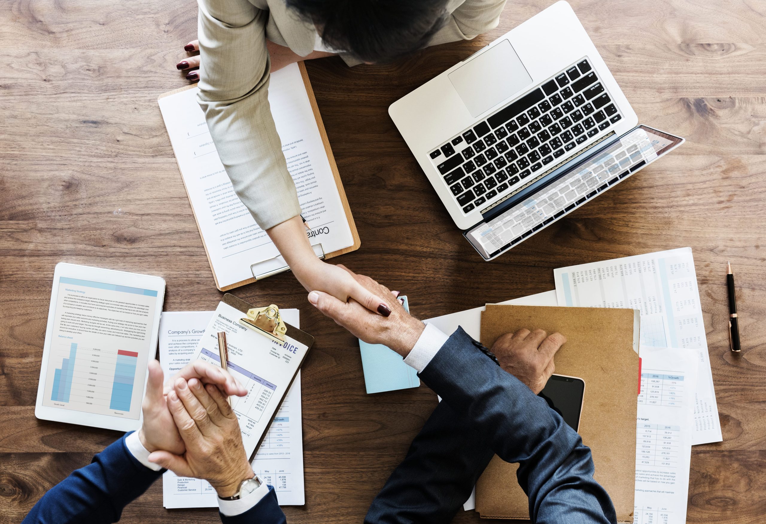 business-people-shaking-hands-together__2___2_